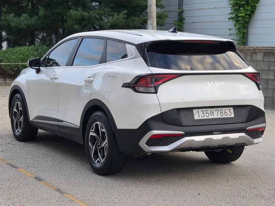 Kia Sportage — фото 7