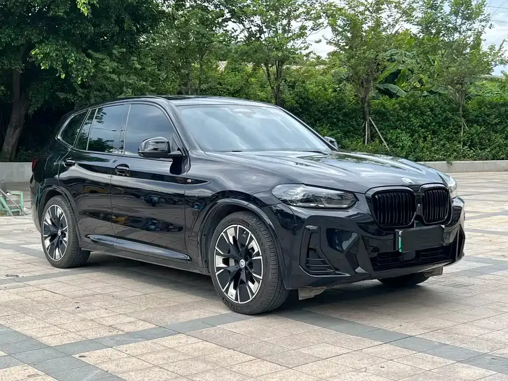 BMW iX3 — фото 8
