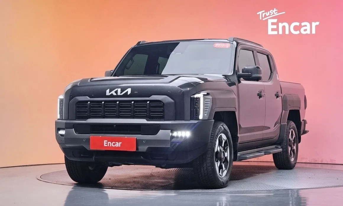 Kia Tasman — фото 1