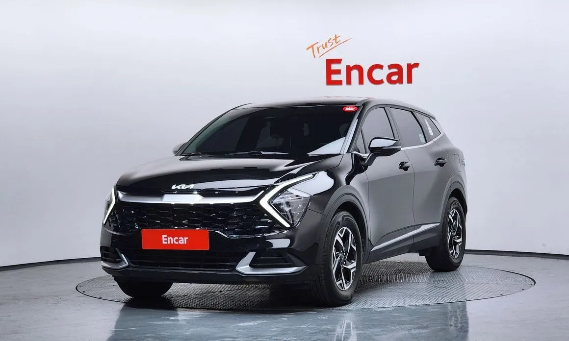 Kia Sportage — фото 1