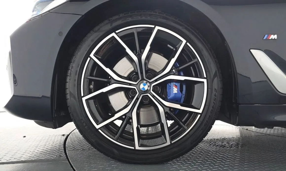 BMW 5-Series — фото 10