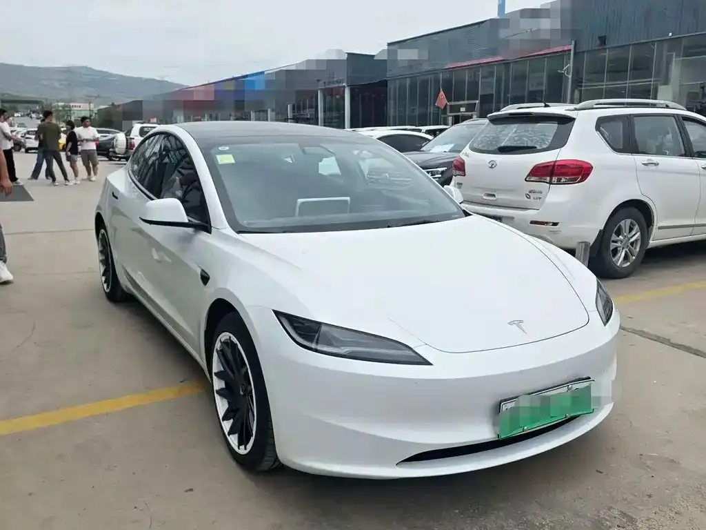 Tesla Model 3 — фото 7