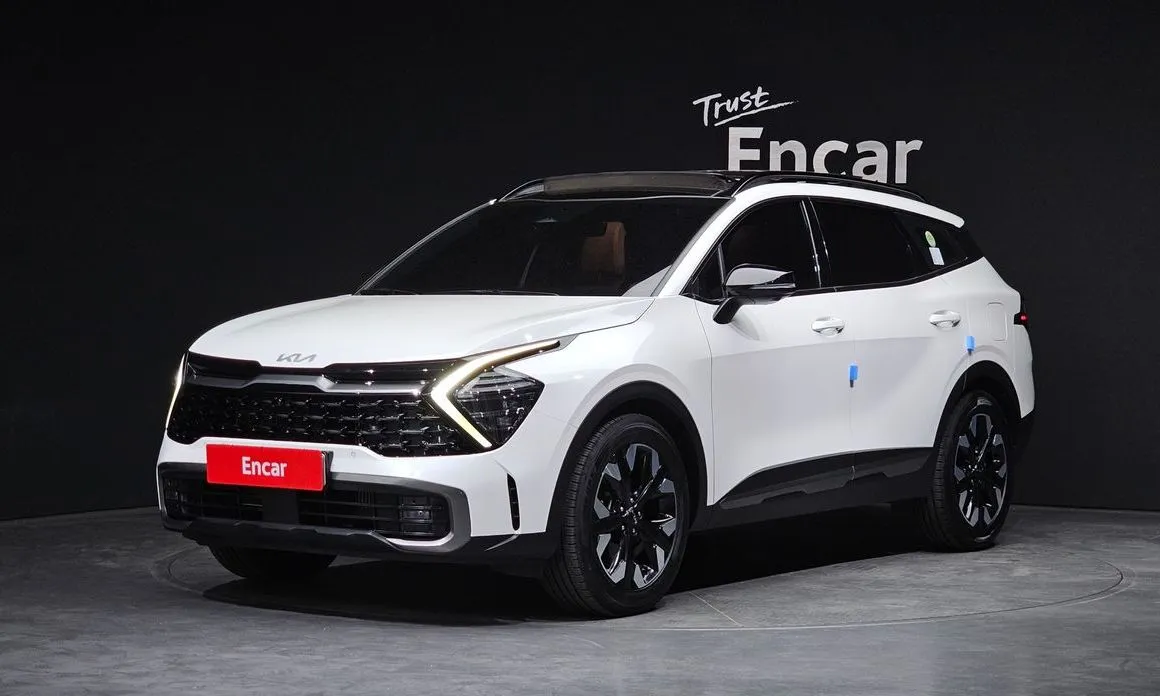 Kia Sportage — фото 1