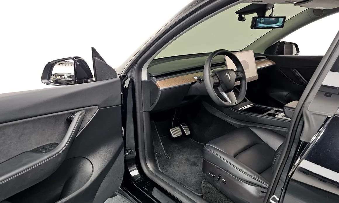 Tesla Model Y — фото 7