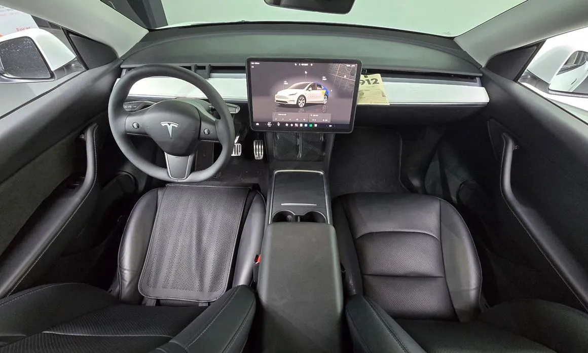 Tesla Model Y — фото 9