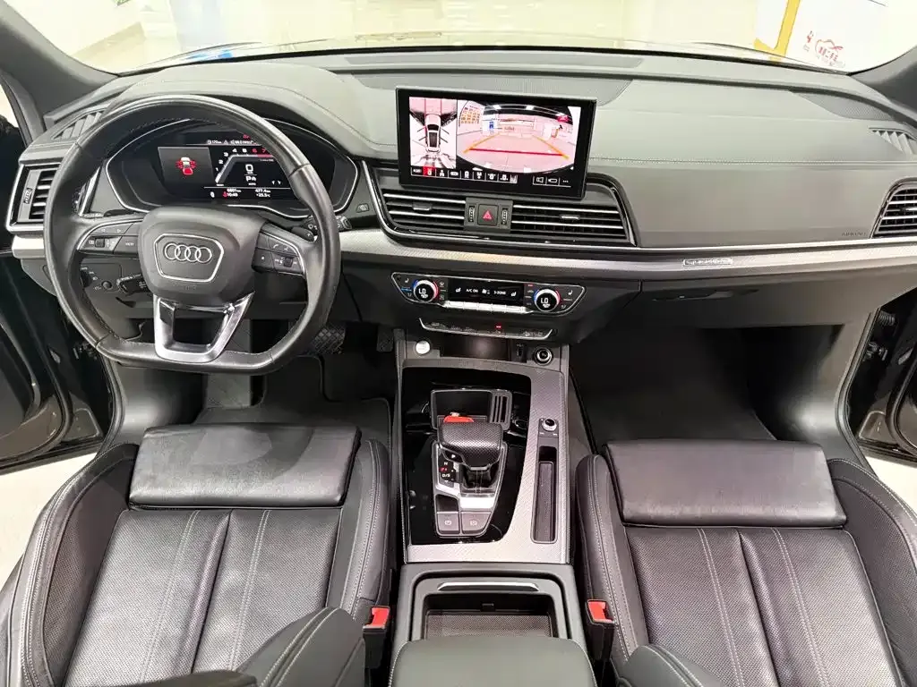 Audi Q5L — фото 6
