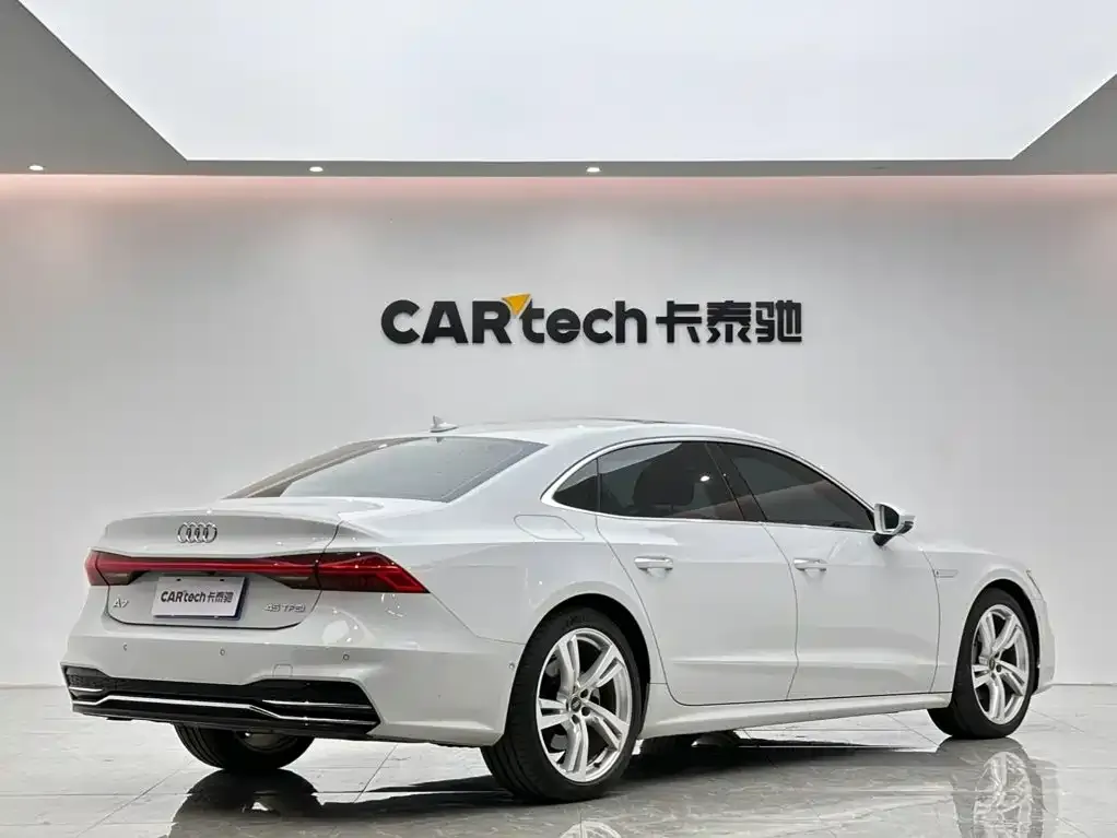 Audi A7L — фото 8