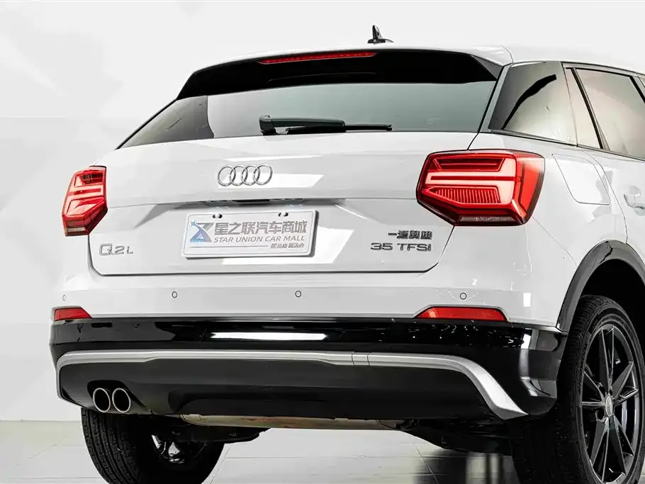 Audi Q2L — фото 10