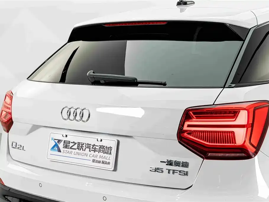 Audi Q2L — фото 6