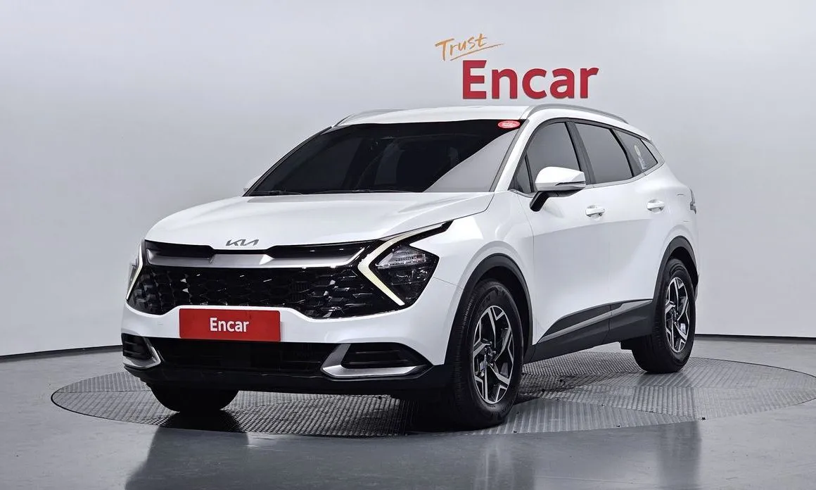 Kia Sportage — фото 1