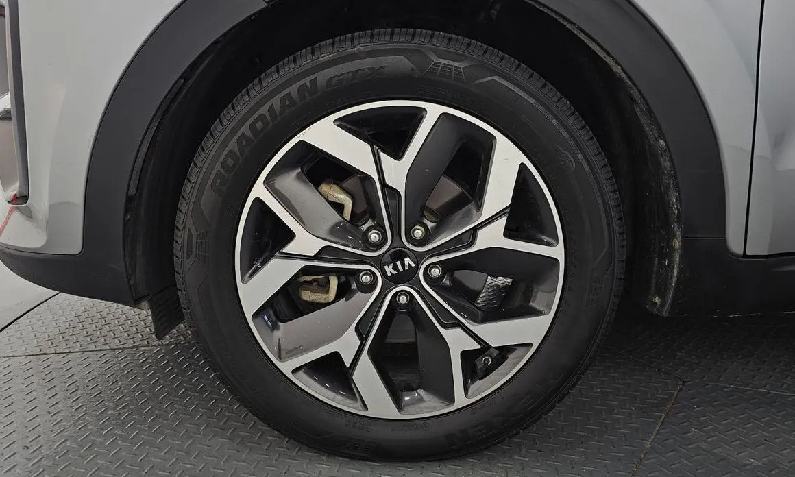 Kia Sportage — фото 8