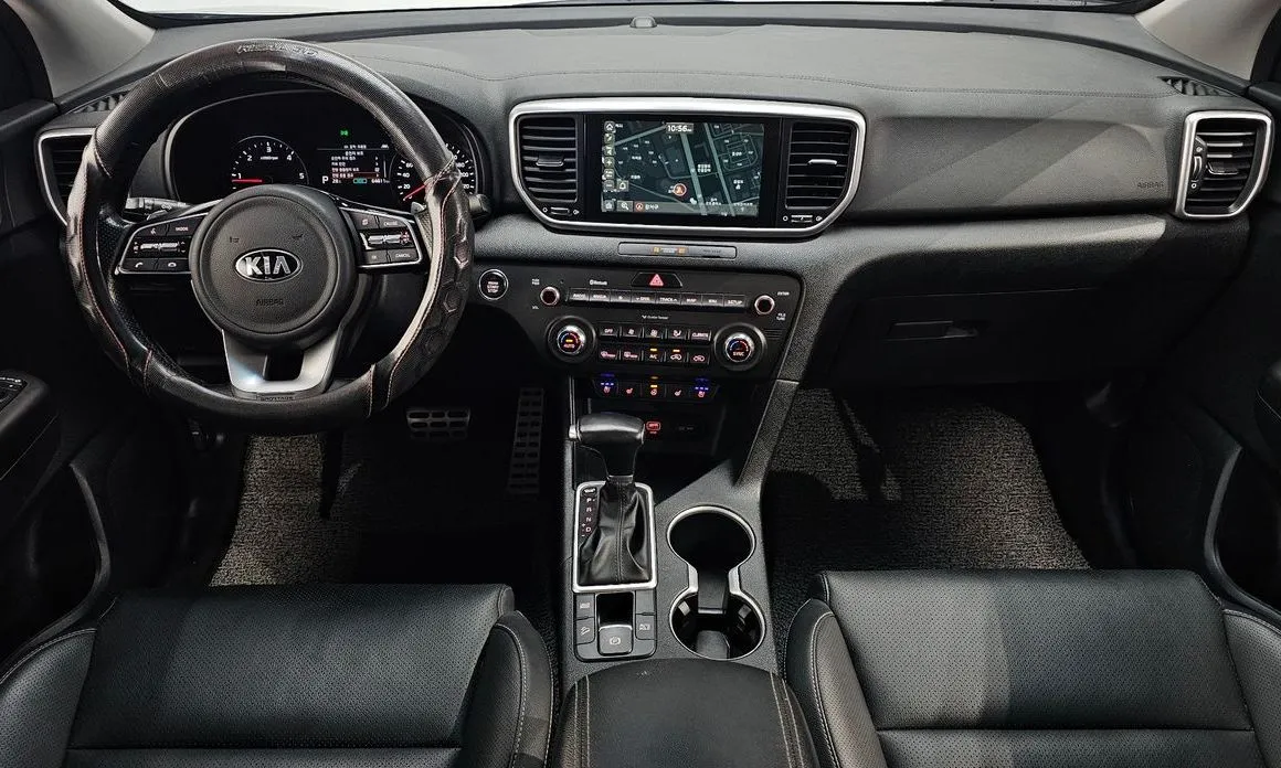 Kia Sportage — фото 10