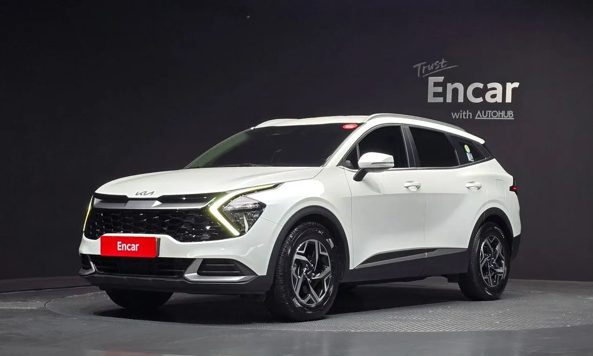 Kia Sportage — фото 1