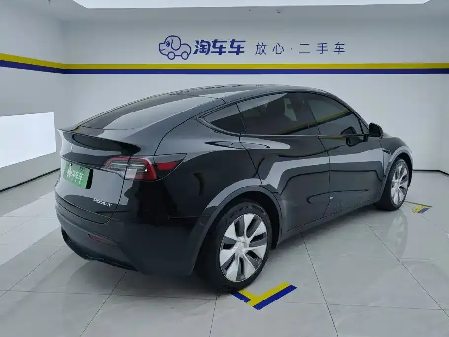 Tesla Model Y — фото 6