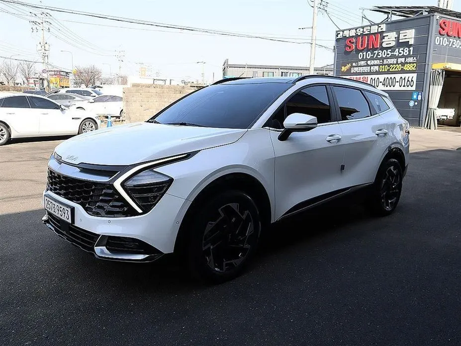 Kia Sportage — фото 7