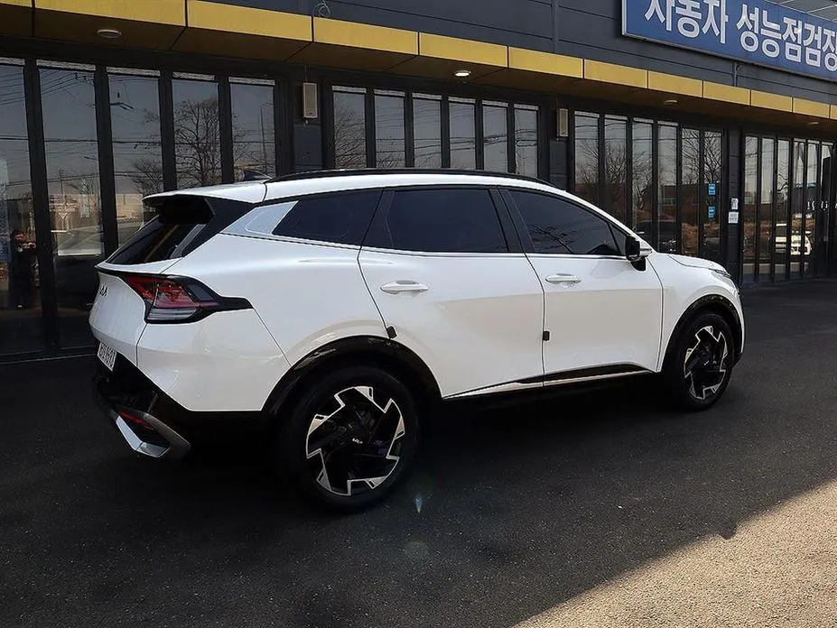 Kia Sportage — фото 9