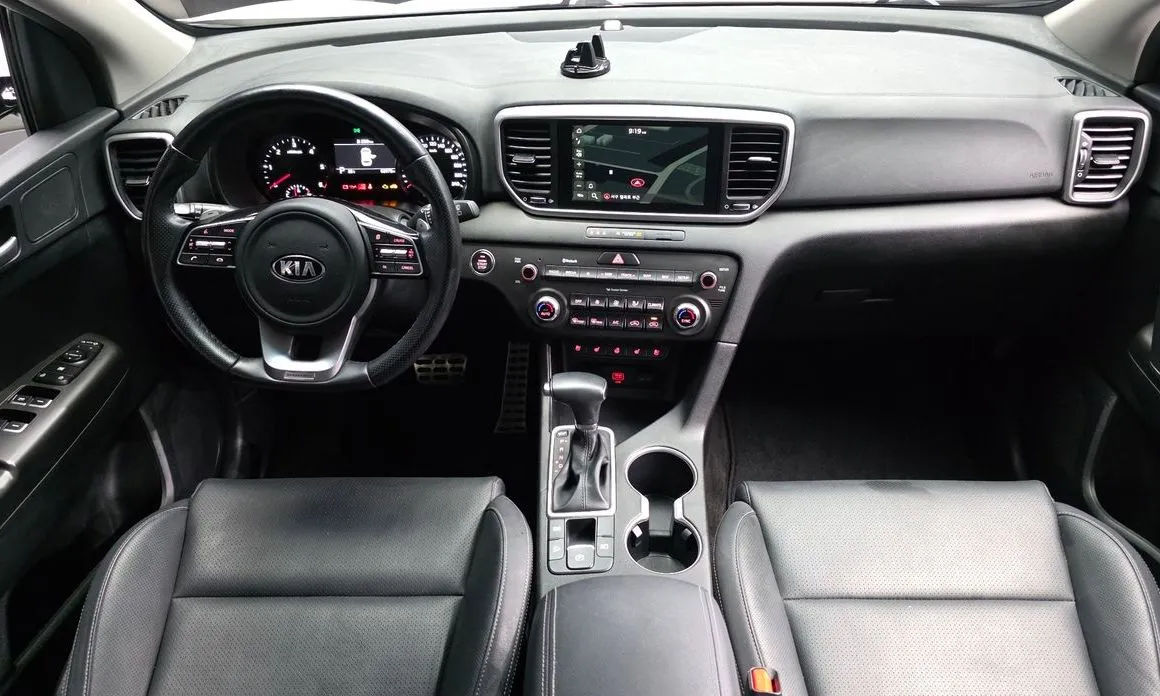 Kia Sportage — фото 9