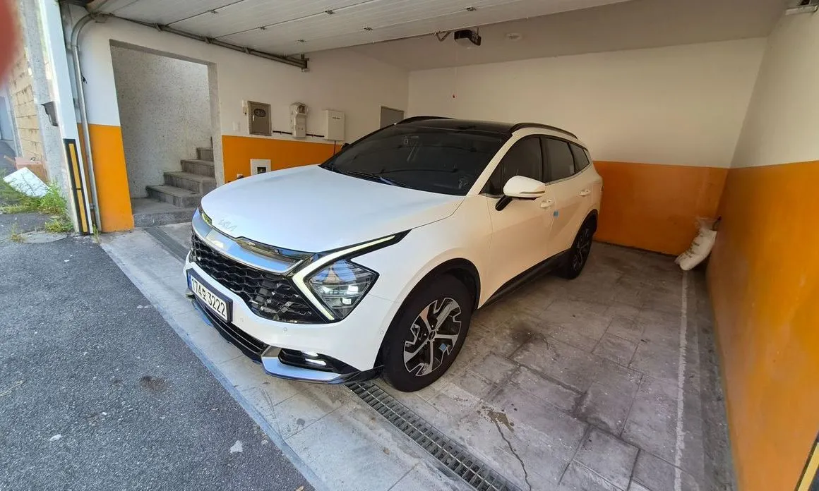 Kia Sportage — фото 1