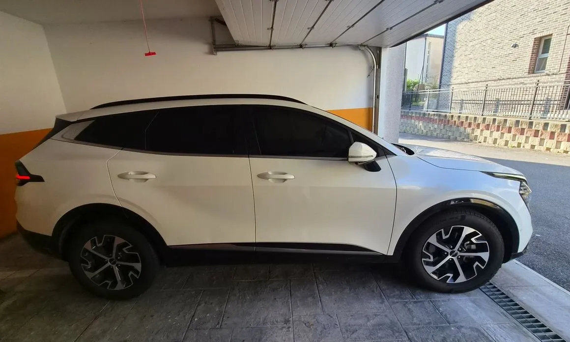 Kia Sportage — фото 8