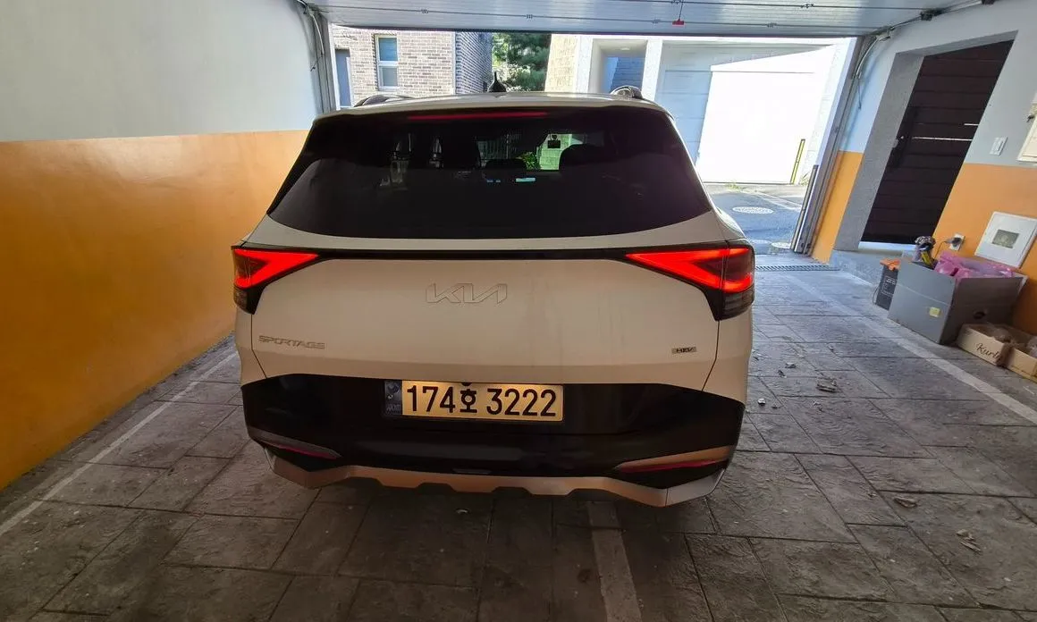 Kia Sportage — фото 10