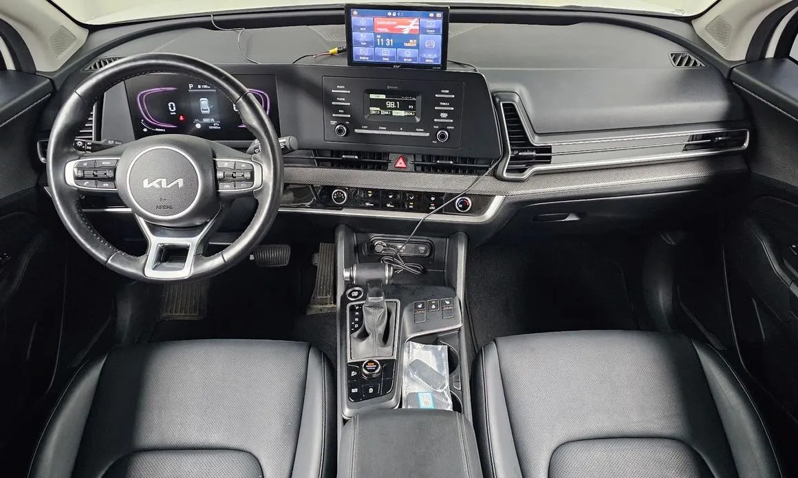 Kia Sportage — фото 9