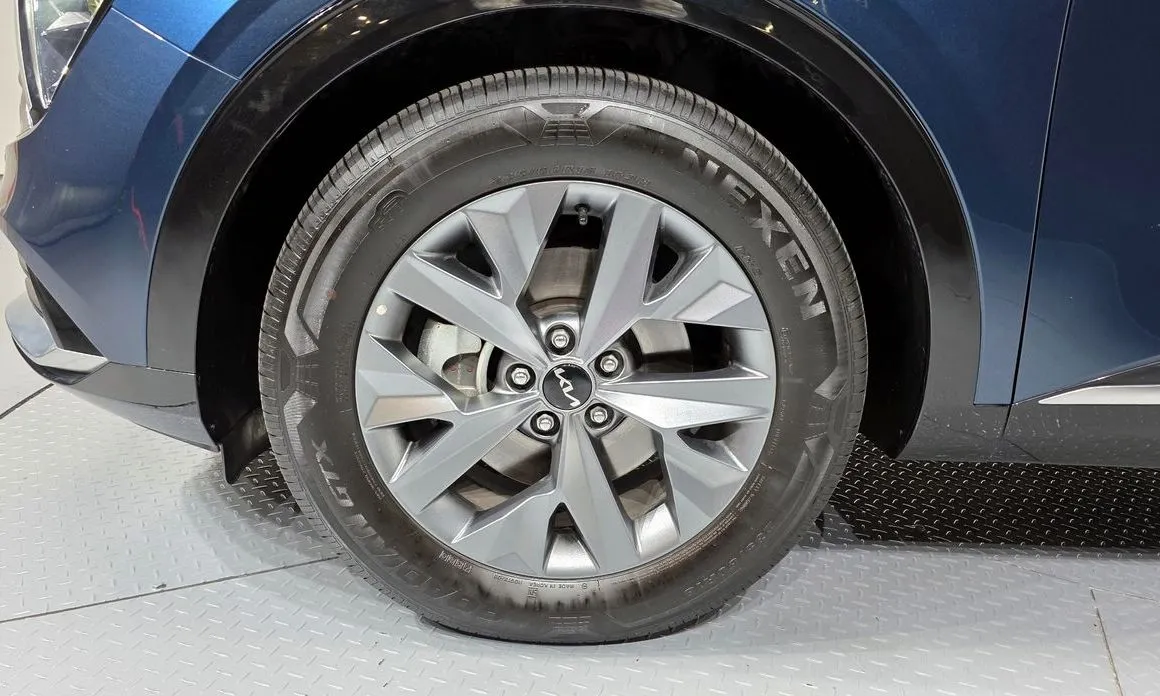 Kia Sportage — фото 9