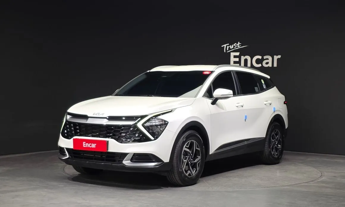 Kia Sportage — фото 1