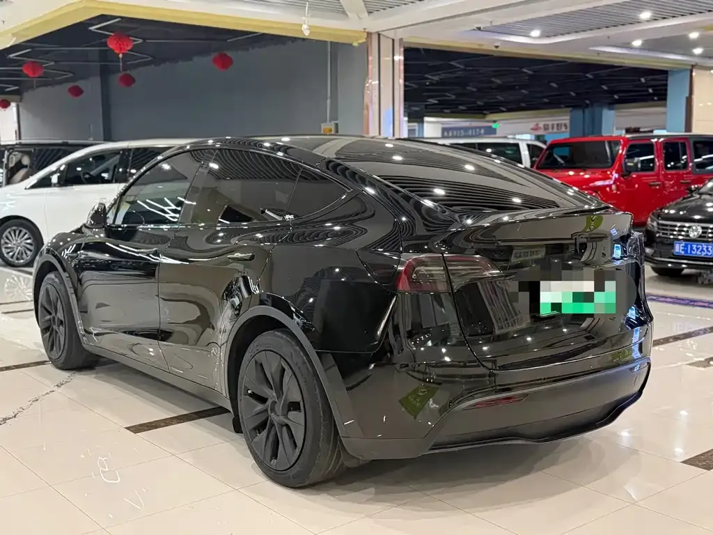 Tesla Model Y — фото 7