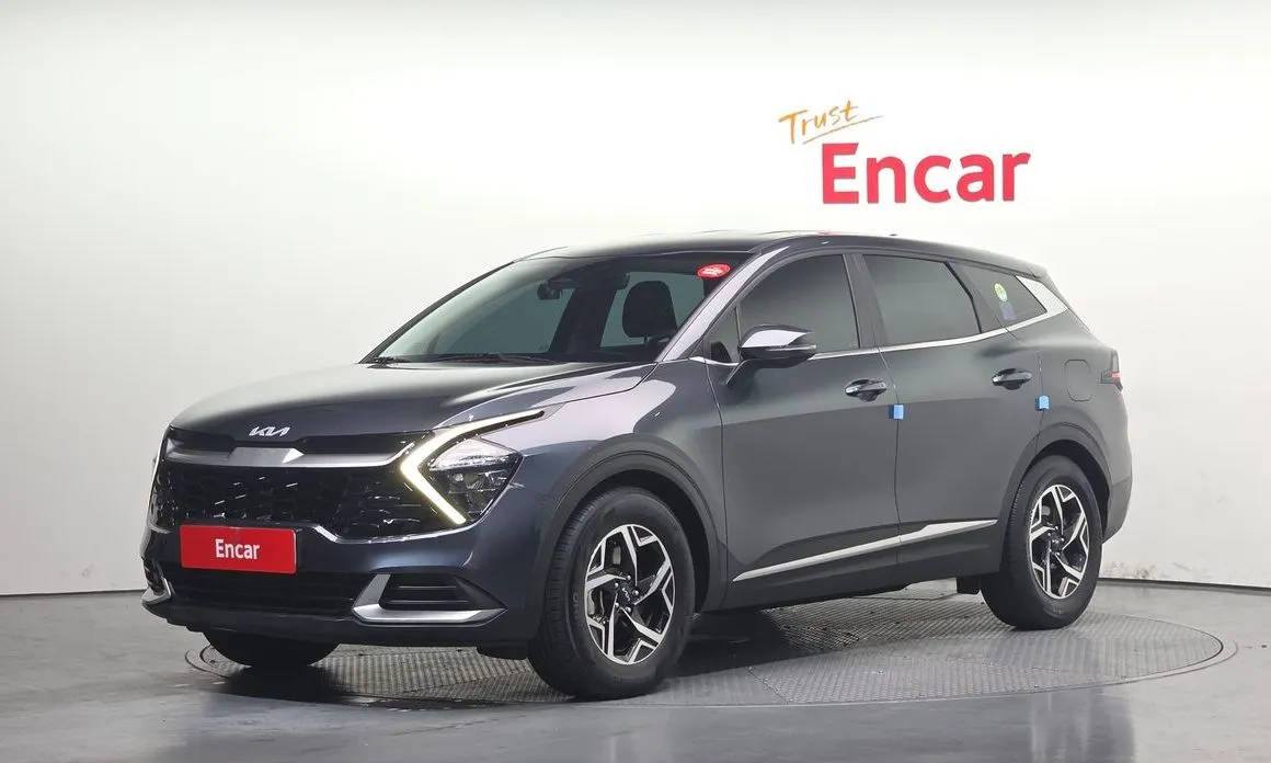 Kia Sportage — фото 1