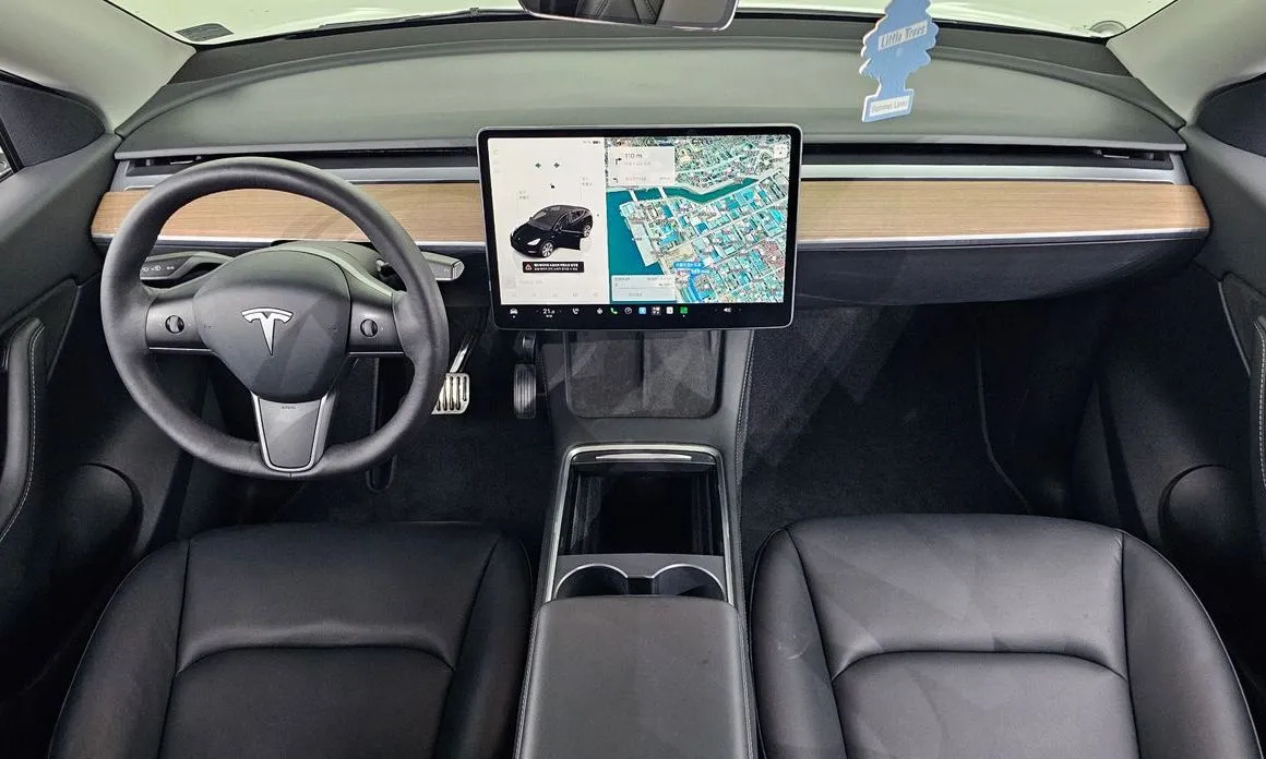 Tesla Model Y — фото 7
