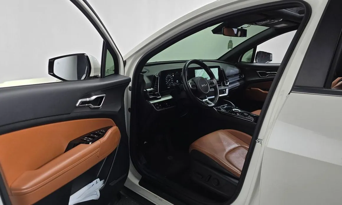 Kia Sportage — фото 7