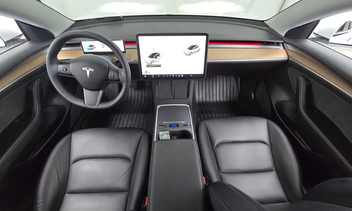 Tesla Model 3 — фото 8