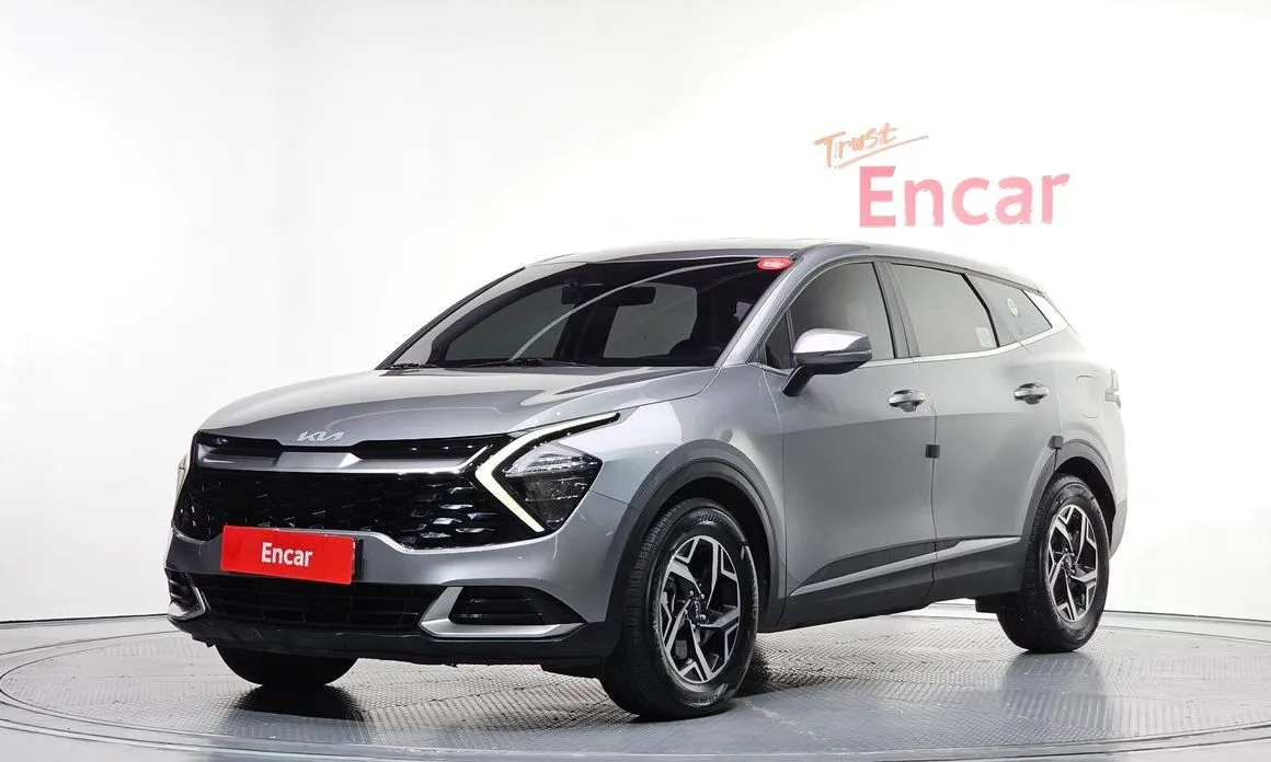 Kia Sportage — фото 1