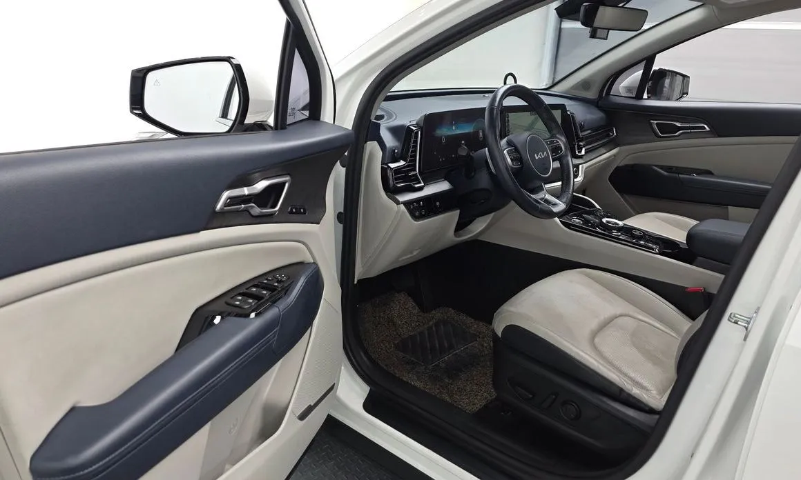 Kia Sportage — фото 7