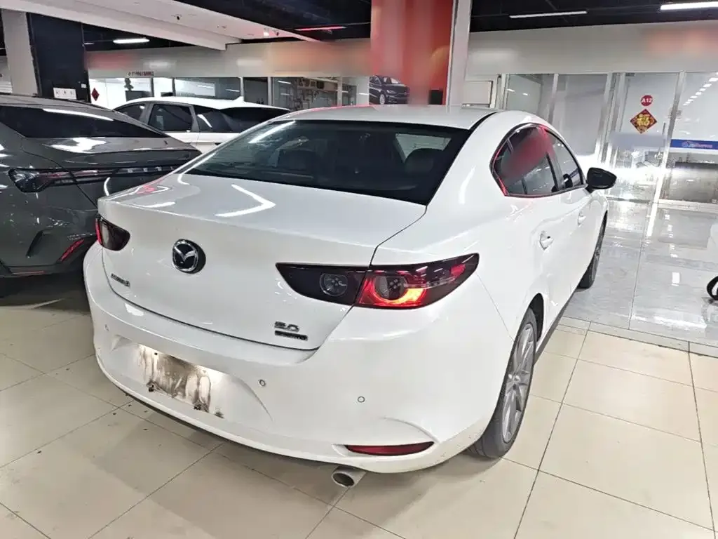 Mazda 3 Axela — фото 9