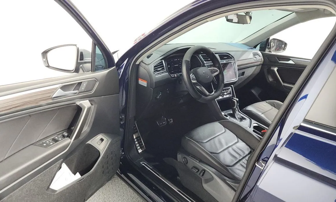 Volkswagen Tiguan — фото 10