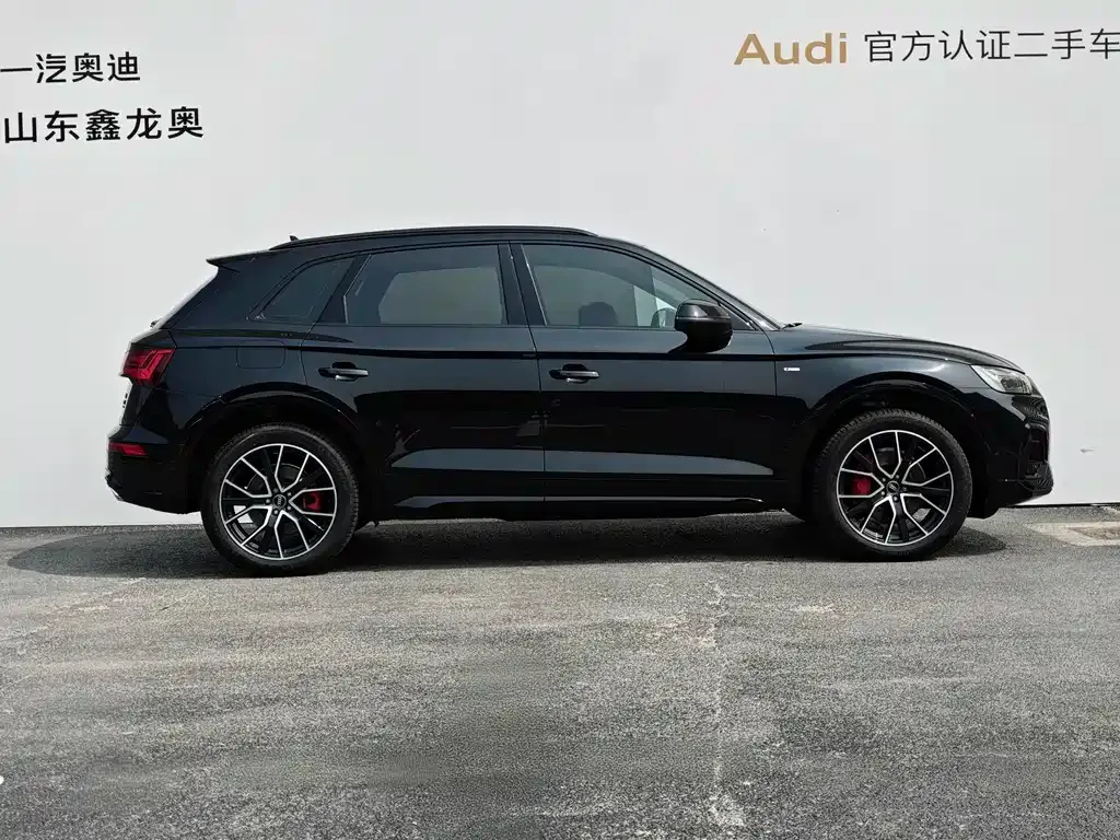 Audi Q5L — фото 5
