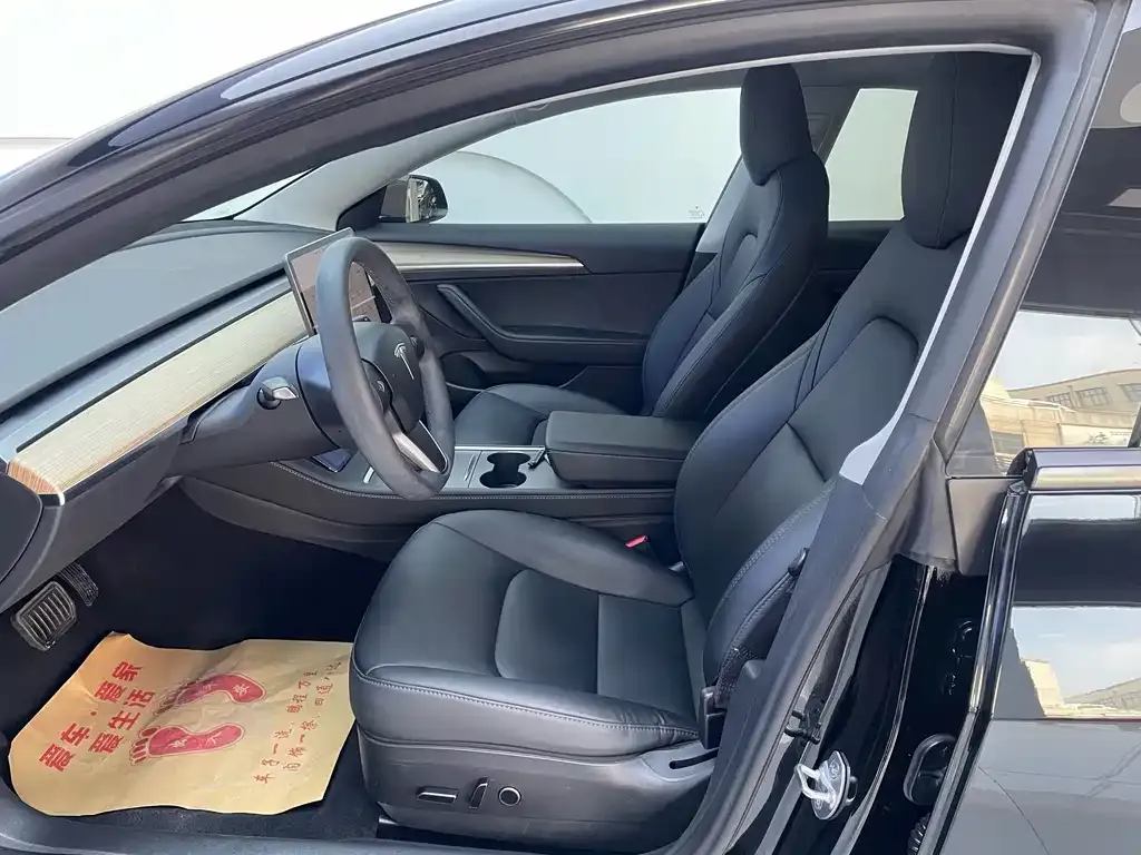 Tesla Model 3 — фото 6