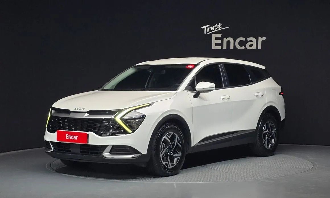 Kia Sportage — фото 1