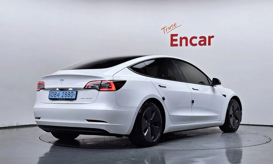 Tesla Model 3 — фото 5