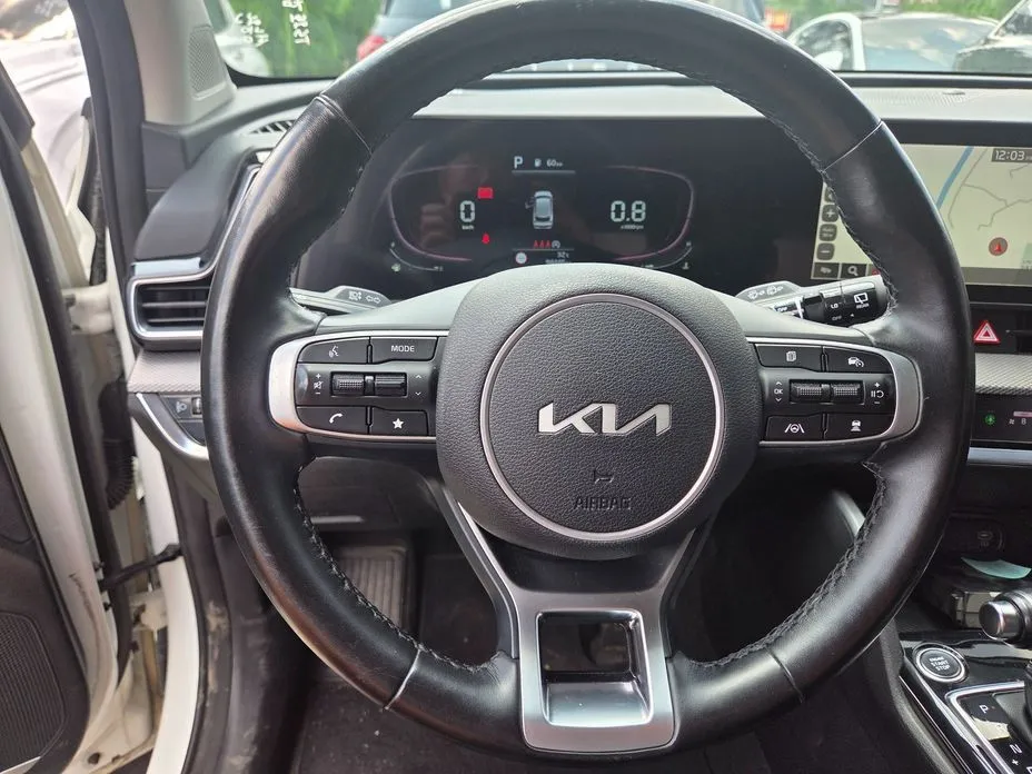 Kia Sportage — фото 7