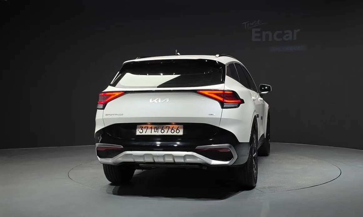 Kia Sportage — фото 7
