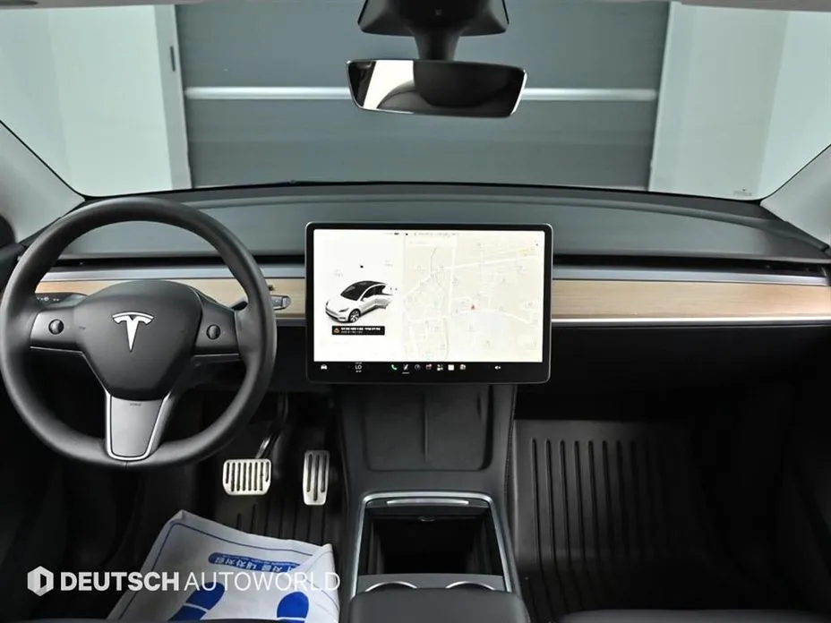 Tesla Model Y — фото 6
