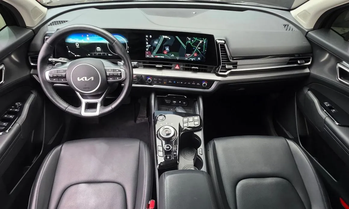 Kia Sportage — фото 6