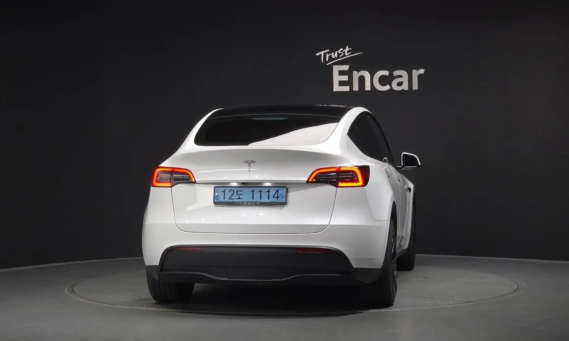 Tesla Model Y — фото 7