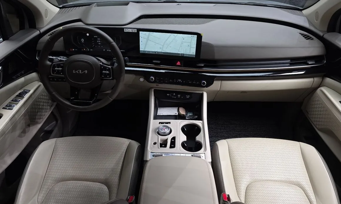 Kia Carnival — фото 10