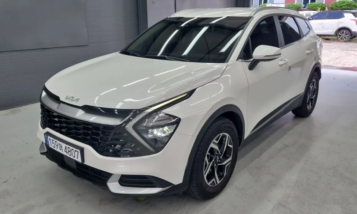 Kia Sportage — фото 1