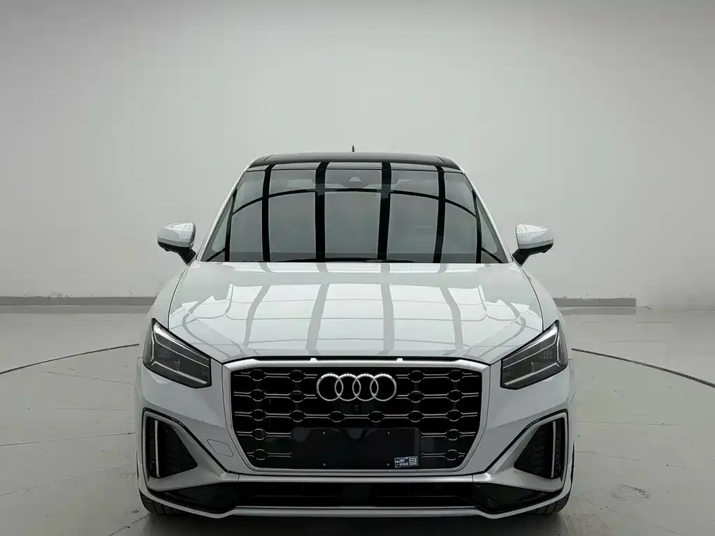 Audi Q2L — фото 7