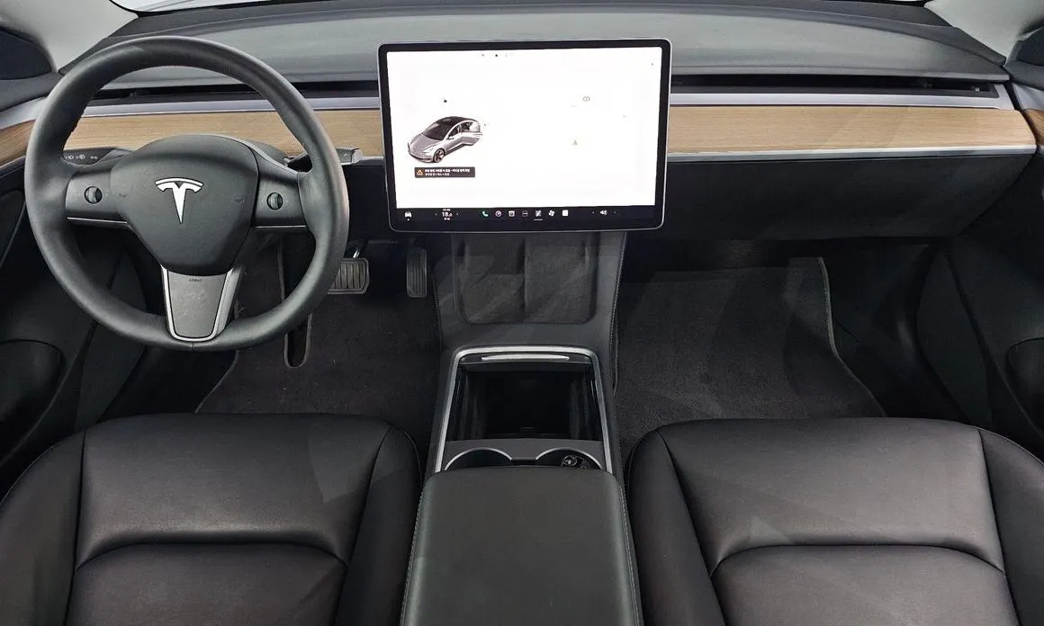 Tesla Model 3 — фото 8