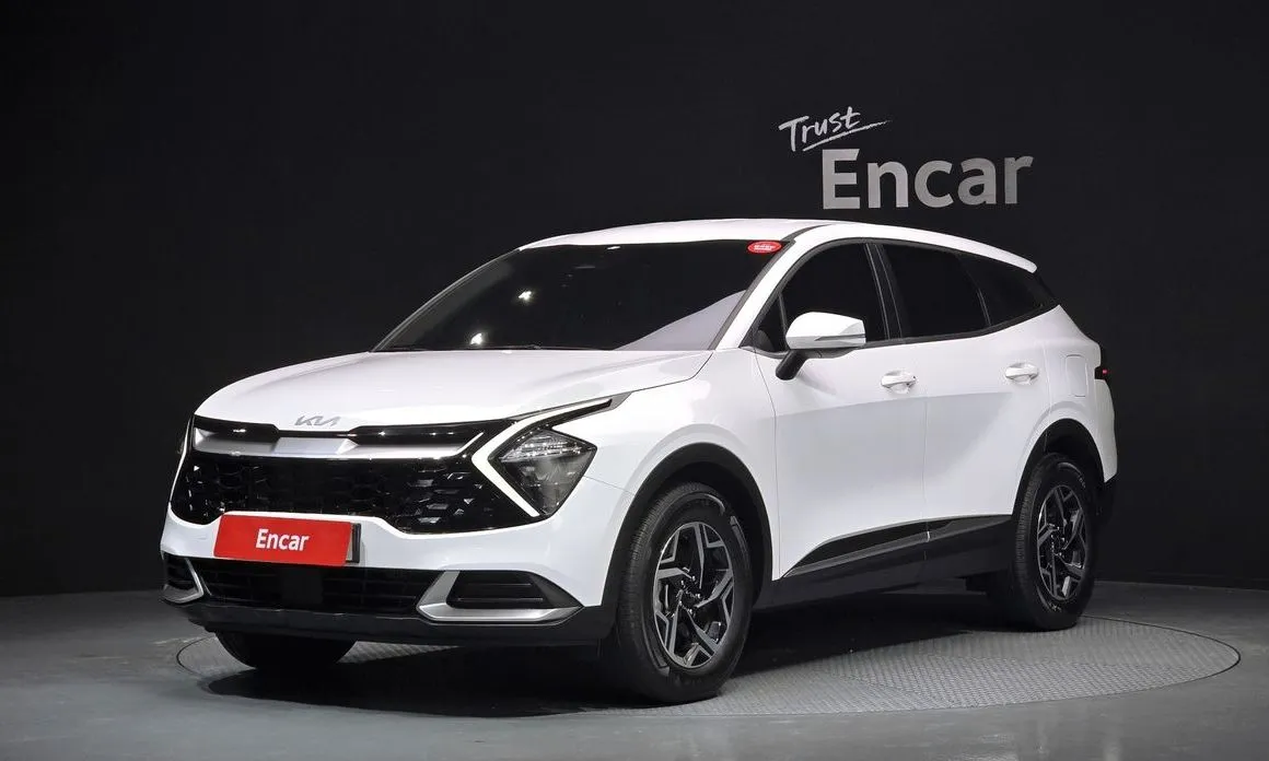 Kia Sportage — фото 1